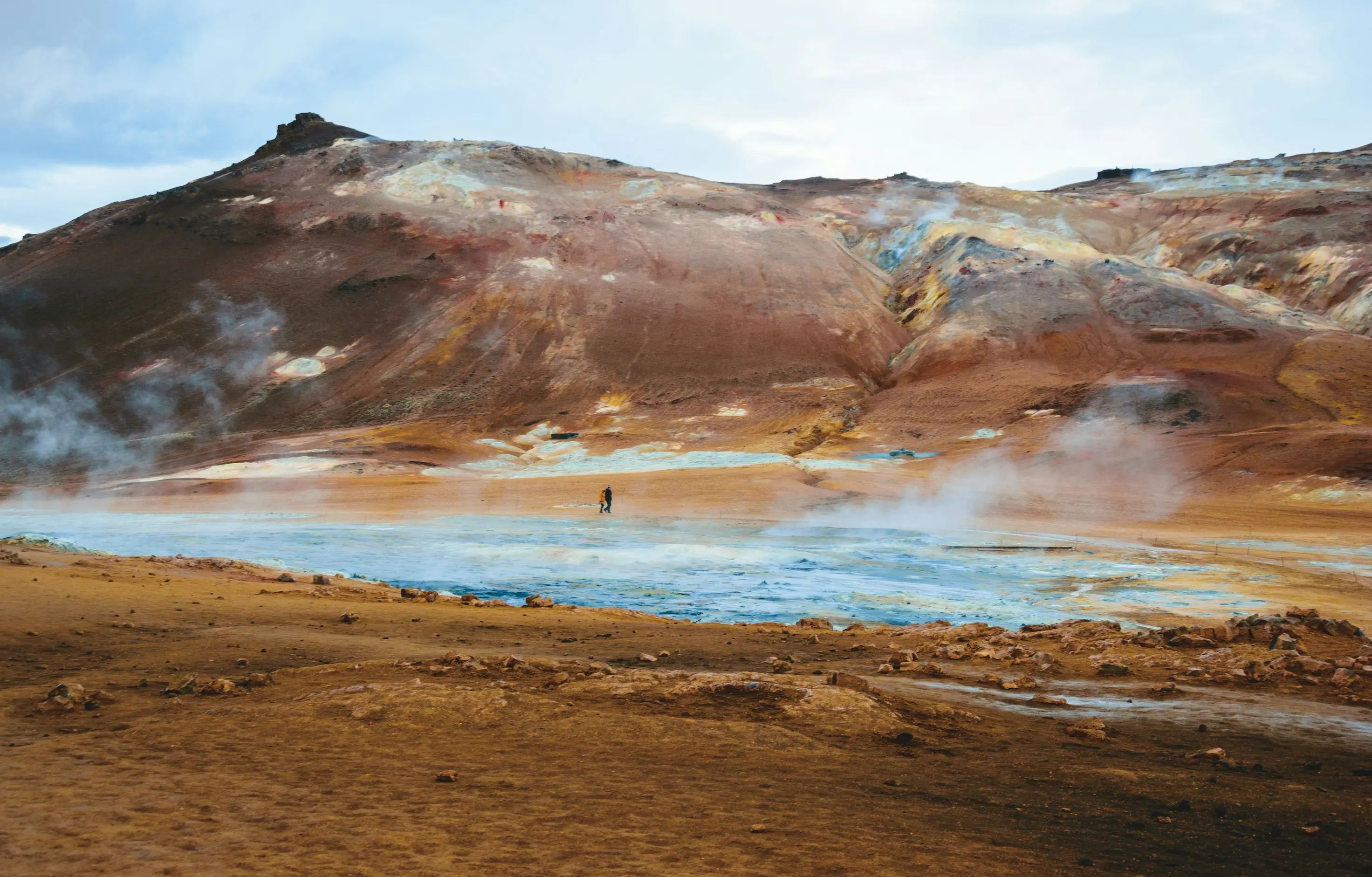 Steam rising across a geothermal field in Kenya's Rift Valley